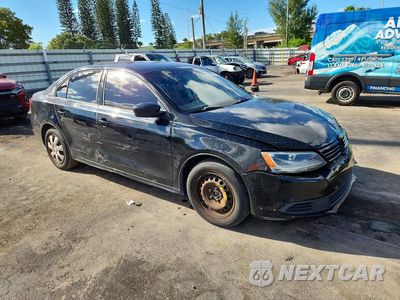 Czwarte zdjęcie samochodu z boku: 2014 VOLKSWAGEN JETTA BASE VIN:3VW2K7AJ5EM436153 - miniatura