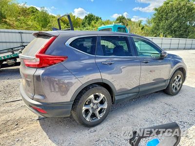 Trzecie zdjęcie samochodu z tyłu: 2017 HONDA CR-V EX VIN:2HKRW2H53HH619322 - miniatura