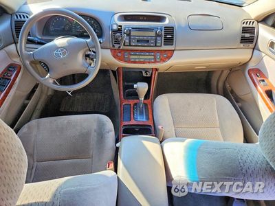 Zdjęcie 8 z 13 samochodu: 2002 TOYOTA CAMRY XLE VIN:4T1BE30K12U631182 - miniatura