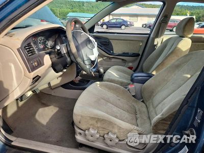 Zdjęcie 7 z 12 samochodu: 2003 HYUNDAI ELANTRA GLS VIN:KMHDN45D73U555168 - miniatura