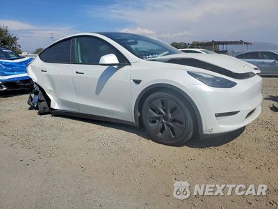 Czwarte zdjęcie samochodu z boku: 2025 TESLA MODEL Y VIN:7SAYGAEE2SF241624 - miniatura