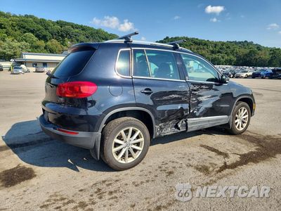 Trzecie zdjęcie samochodu z tyłu: 2017 VOLKSWAGEN TIGUAN WOLFSBURG VIN:WVGSV7AXXHK008939 - miniatura