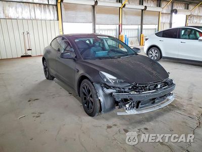 Czwarte zdjęcie samochodu z boku: 2023 TESLA MODEL 3 VIN:5YJ3E1EB8PF386323 - miniatura