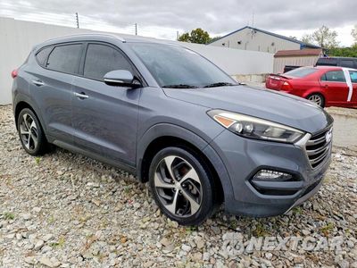 Czwarte zdjęcie samochodu z boku: 2016 HYUNDAI TUCSON LIMITED VIN:KM8J33A20GU136351 - miniatura