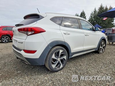 Trzecie zdjęcie samochodu z tyłu: 2017 HYUNDAI TUCSON SPORT VIN:KM8J33A26HU549327 - miniatura
