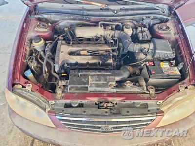 Zdjęcie 11 z 12 samochodu: 2002 KIA SPECTRA BASE VIN:KNAFB121925129082 - miniatura