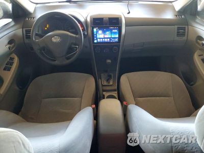 Zdjęcie 8 z 12 samochodu: 2009 TOYOTA COROLLA LE VIN:JTDBL40E999039715 - miniatura