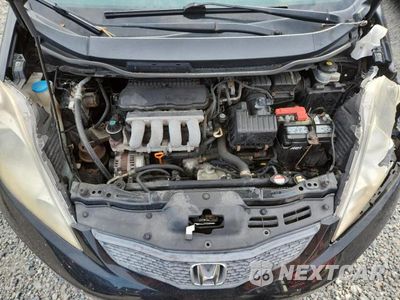 Zdjęcie 11 z 12 samochodu: 2009 HONDA FIT SPORT VIN:JHMGE88659S052814 - miniatura