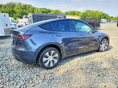Trzecie zdjęcie samochodu z tyłu: 2023 TESLA MODEL Y VIN:7SAYGAEE4PF844193 - miniatura