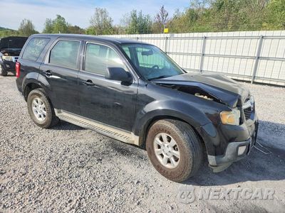Czwarte zdjęcie samochodu z boku: 2011 MAZDA TRIBUTE I VIN:4F2CY0C73BKM05386 - miniatura