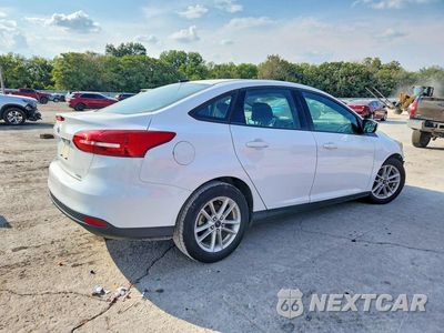 Trzecie zdjęcie samochodu z tyłu: 2018 FORD FOCUS SE VIN:1FADP3FEXJL241636 - miniatura
