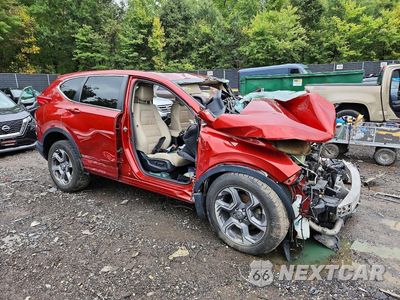 Czwarte zdjęcie samochodu z boku: 2017 HONDA CR-V EXL VIN:2HKRW2H82HH631777 - miniatura