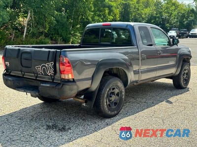 Czwarte zdjęcie samochodu z boku: 2013 TOYOTA TACOMA BASE VIN:5TFUX4ENXDX017331 - miniatura