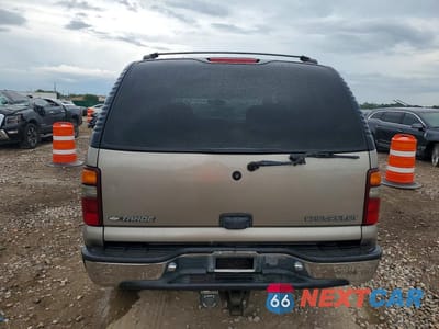 Zdjęcie 6 z 13 samochodu: 2001 CHEVROLET TAHOE C1500 VIN:1GNEC13T41J153816 - miniatura