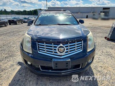 Piąte zdjęcie samochodu w środku: 2014 CADILLAC SRX PERFORMANCE COLLECTION VIN:3GYFNFE37ES572498 - miniatura