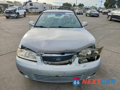Piąte zdjęcie samochodu w środku: 2002 NISSAN SENTRA GXE VIN:3N1CB51A52L551142 - miniatura