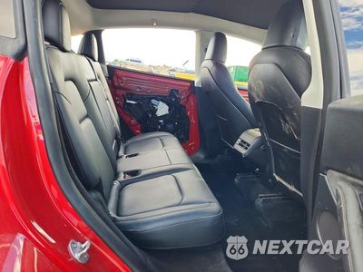 Zdjęcie 11 z 14 samochodu: 2023 TESLA MODEL Y VIN:7SAYGDEE0PA023364 - miniatura