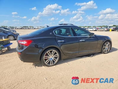 Trzecie zdjęcie samochodu z tyłu: 2014 MASERATI GHIBLI S VIN:ZAM57RTA2E1117781 - miniatura
