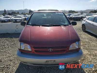 Piąte zdjęcie samochodu w środku: 1999 TOYOTA SIENNA XLE VIN:4T3ZF13C3XU125923 - miniatura