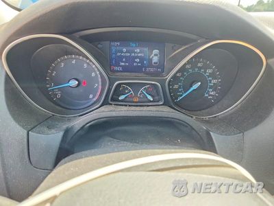 Zdjęcie 9 z 12 samochodu: 2014 FORD FOCUS SE VIN:1FADP3F23EL270570 - miniatura