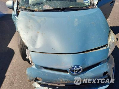 Zdjęcie 11 z 12 samochodu: 2015 TOYOTA PRIUS TWO VIN:JTDKN3DUXF1924084 - miniatura