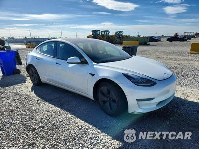 Czwarte zdjęcie samochodu z boku: 2021 TESLA MODEL 3 VIN:5YJ3E1EB7MF849385 - miniatura