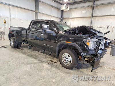 Czwarte zdjęcie samochodu z boku: 2022 GMC SIERRA K3500 DENALI VIN:1GT49WEY9NF229435 - miniatura
