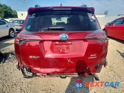 Zdjęcie 6 z 13 samochodu: 2018 TOYOTA RAV4 HYBRID XLE VIN:JTMRJREV9JD174317 - miniatura