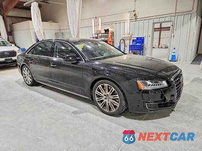 Czwarte zdjęcie samochodu z boku: 2015 AUDI A8 L QUATTRO VIN:WAU3GAFD6FN037829 - miniatura