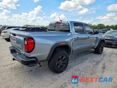 Trzecie zdjęcie samochodu z tyłu: 2024 GMC CANYON ELEVATION VIN:1GTP5BEK8R1269294 - miniatura