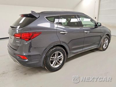 Trzecie zdjęcie samochodu z tyłu: 2017 HYUNDAI SANTA FE SPORT 2.4L VIN:5XYZU3LB5HG427688 - miniatura