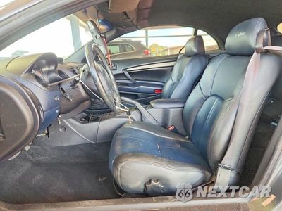 Zdjęcie 7 z 12 samochodu: 2003 MITSUBISHI ECLIPSE SPYDER GS VIN:4A3AE45G83E117588 - miniatura