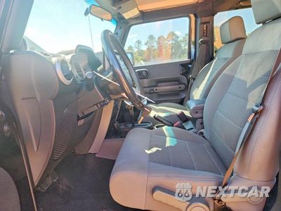Zdjęcie 7 z 13 samochodu: 2009 JEEP WRANGLER UNLIMITED SAHARA VIN:1J4GA59159L772763 - miniatura