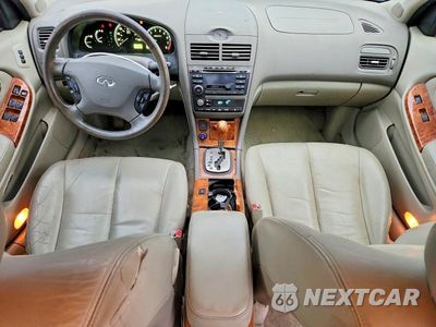 Zdjęcie 8 z 12 samochodu: 2003 INFINITI I35 BASE VIN:JNKDA31A83T114028 - miniatura