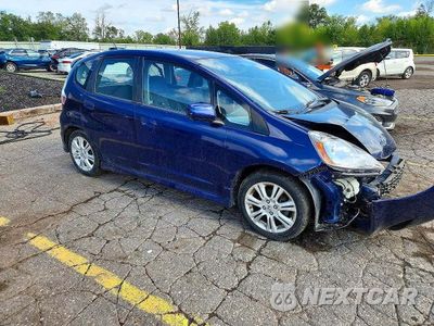 Czwarte zdjęcie samochodu z boku: 2009 HONDA FIT SPORT VIN:JHMGE88439S002881 - miniatura