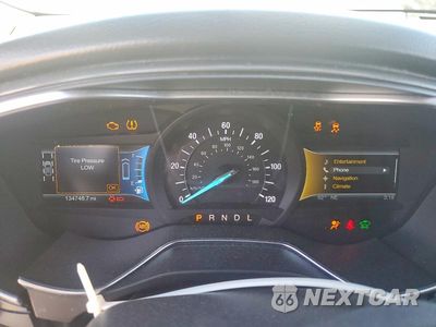 Zdjęcie 9 z 12 samochodu: 2014 FORD FUSION TITANIUM PHEV VIN:3FA6P0SU6ER142498 - miniatura