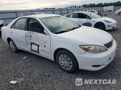 Czwarte zdjęcie samochodu z boku: 2002 TOYOTA CAMRY LE VIN:JTDBE32K320128469 - miniatura