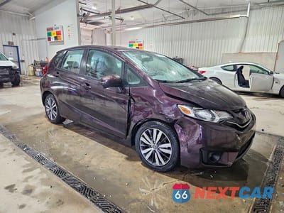Czwarte zdjęcie samochodu z boku: 2017 HONDA FIT EX VIN:3HGGK5H88HM702688 - miniatura