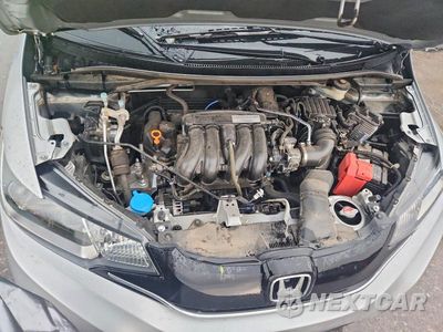 Zdjęcie 11 z 12 samochodu: 2016 HONDA FIT EX VIN:JHMGK5H79GX036261 - miniatura