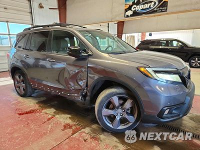 Czwarte zdjęcie samochodu z boku: 2020 HONDA PASSPORT TOURING VIN:5FNYF8H92LB011901 - miniatura