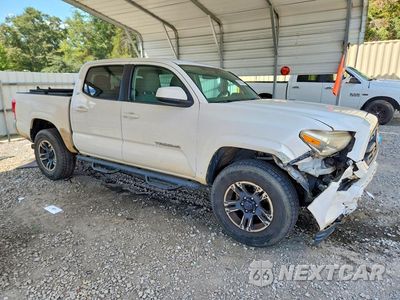 Czwarte zdjęcie samochodu z boku: 2016 TOYOTA TACOMA SR5 V6 VIN:3TMAZ5CN1GM001826 - miniatura