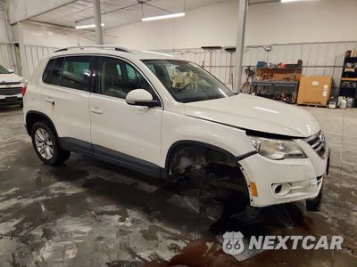 Czwarte zdjęcie samochodu z boku: 2009 VOLKSWAGEN TIGUAN SE VIN:WVGBV75N09W000304 - miniatura
