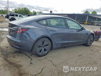 Trzecie zdjęcie samochodu z tyłu: 2023 TESLA MODEL 3 VIN:5YJ3E1EAXPF644199 - miniatura