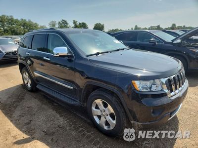 Czwarte zdjęcie samochodu z boku: 2013 JEEP GRAND CHEROKEE LIMITED VIN:1C4RJFBT4DC500035 - miniatura