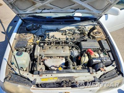 Zdjęcie 11 z 12 samochodu: 1997 TOYOTA COROLLA DX VIN:1NXBB02E9VZ652932 - miniatura