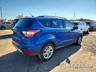 Trzecie zdjęcie samochodu z tyłu: 2018 FORD ESCAPE SE VIN:1FMCU0GD8JUC30286 - miniatura