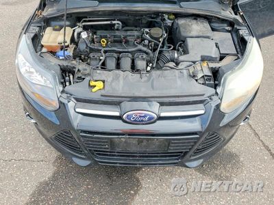 Zdjęcie 11 z 12 samochodu: 2014 FORD FOCUS TITANIUM VIN:1FADP3N24EL271549 - miniatura
