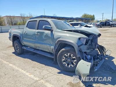 Czwarte zdjęcie samochodu z boku: 2022 TOYOTA TACOMA TRD OFF-ROAD VIN:3TMCZ5AN1NM531173 - miniatura