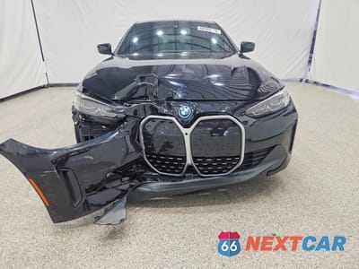 Piąte zdjęcie samochodu w środku: 2024 BMW I4 EDRIVE 35 VIN:WBY43AW01RFS85435 - miniatura
