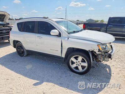 Czwarte zdjęcie samochodu z boku: 2014 JEEP COMPASS LATITUDE VIN:1C4NJCEA5ED890517 - miniatura